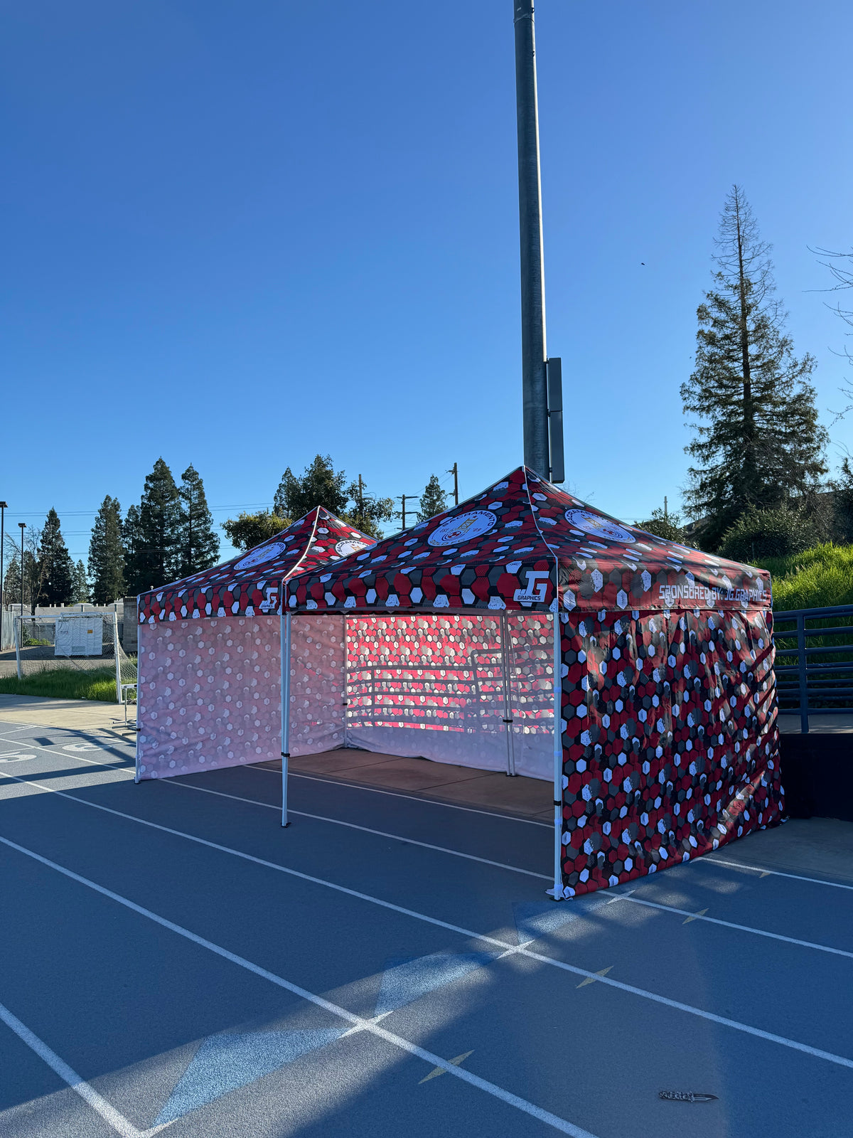 Custom printed EZ Up canopy with sidewalls for events
